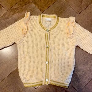 Cream and gold infant sweater